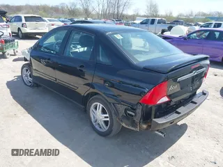 2000 Ford Focus SE with VIN 1FAFP3436YW262356, listed as a IAAI auction lot 42092884 with 123,618 mi miles and . Bid and sale history available at carsss.com. Image 3.