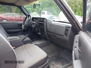 2001 Jeep Cherokee with VIN 1J4FT47S11L609530, listed as a IAAI auction lot 42222446 with 156,408 mi miles and . Bid and sale history available at DreamBid. Image 5.