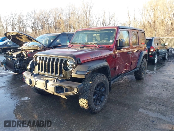 2022 Jeep Wrangler Unlimited Sport with VIN 1C4HJXDG1NW106171, listed as a IAAI auction lot 41357206 with 36,932 mi miles and . Bid and sale history available at DreamBid. Image 2.
