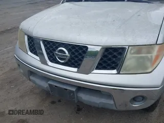 2006 Nissan Frontier SE with VIN 1N6AD07W66C451179, listed as a IAAI auction lot 42320667 with 210,610 mi miles and . Bid and sale history available at DreamBid. Image 6.