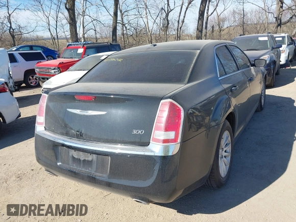 2014 Chrysler 300 with VIN 2C3CCAAG3EH252841, listed as a IAAI auction lot 41770242 with 214,000 mi miles. Bid and sale history available at carsss.com. Image 4.