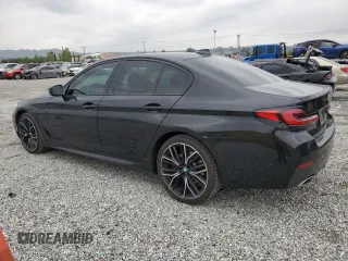 2021 BMW 5 Series 530e with VIN WBA13AG00MCF09677, listed as a Copart auction lot 54907205 with 50,033 mi miles and Salvage title. Bid and sale history available at DreamBid. Image 2.