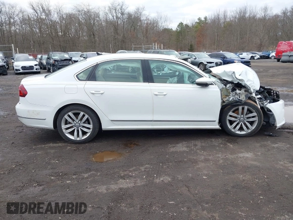 2017 Volkswagen Passat SE z VIN 1VWGT7A35HC052769, wystawiony jako IAAI lot #41687009 z przebiegiem 59 791 mil mil oraz . Historia ofert i sprzedaży dostępna na DreamBid. Obrazek 13.