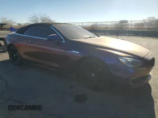 2012 BMW 6 Series 650i z VIN WBALZ3C50CC397706, wystawiony jako Copart lot #89402265 z przebiegiem 92 186 mil mil oraz Szkoda całkowita • Salvage title. Historia ofert i sprzedaży dostępna na DreamBid. Obrazek 4.