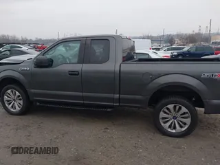 2017 Ford F-150 XL z VIN 1FTFX1EFXHKE03394, wystawiony jako IAAI lot #41471000 z przebiegiem 217 333 mil mil oraz . Historia ofert i sprzedaży dostępna na DreamBid. Obrazek 14.