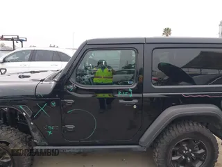 2021 Jeep Wrangler Sport with VIN 1C4GJXAN5MW627228, listed as a IAAI auction lot 42170010 with 56,965 mi miles and . Bid and sale history available at DreamBid. Image 14.