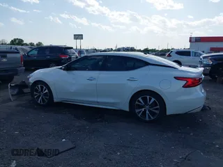 2016 Nissan Maxima SV z VIN 1N4AA6AP9GC431466, wystawiony jako IAAI lot #42007934 z przebiegiem 263 333 mil mil oraz . Historia ofert i sprzedaży dostępna na DreamBid. Obrazek 14.