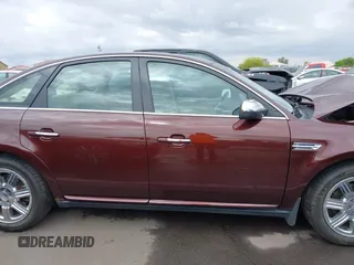 2009 Ford Taurus Limited z VIN 1FAHP25W59G115291, wystawiony jako IAAI lot #42195549 z przebiegiem 58 983 mil mil oraz . Historia ofert i sprzedaży dostępna na DreamBid. Obrazek 14.