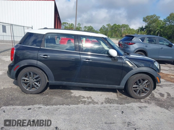 2013 MINI Countryman S with VIN WMWZC3C5XDWP24270, listed as a IAAI auction lot 42232550 with 95,512 mi miles and . Bid and sale history available at DreamBid. Image 13.