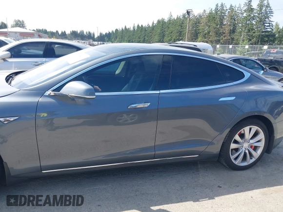 2014 Tesla Model S 60 with VIN 5YJSA1H18EFP38078, listed as a IAAI auction lot 42748619 with 159,285 mi miles and . Bid and sale history available at DreamBid. Image 14.