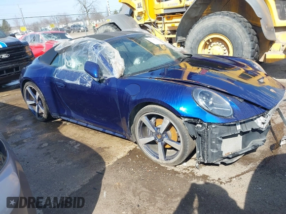 2022 Porsche 911 Carrera with VIN WP0CA2A96NS236957, listed as a IAAI auction lot 41154002 with 34,056 mi miles and . Bid and sale history available at DreamBid. Image 1.