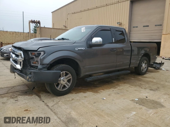 2015 Ford F-150 XL with VIN 1FTEX1C8XFFA48801, listed as a Copart auction lot 43728595 with 144,829 mi miles and Salvage Title. Bid and sale history available at carsss.com. Image 1.