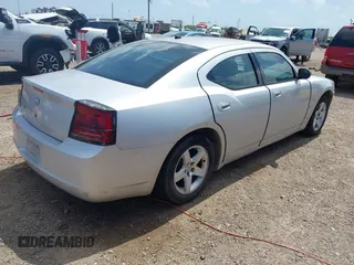 2008 Dodge Charger z VIN 2B3KA43GX8H303530, wystawiony jako IAAI lot #42448562 z przebiegiem 234 466 mil mil oraz . Historia ofert i sprzedaży dostępna na DreamBid. Obrazek 4.