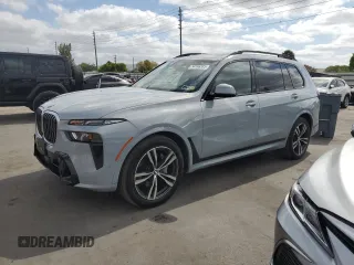 2023 BMW X7 xDrive40i with VIN 5UX23EM06P9M76099, listed as a Copart auction lot 54166385 with 67,400 mi miles and Clean Title. Bid and sale history available at carsss.com. Image 1.