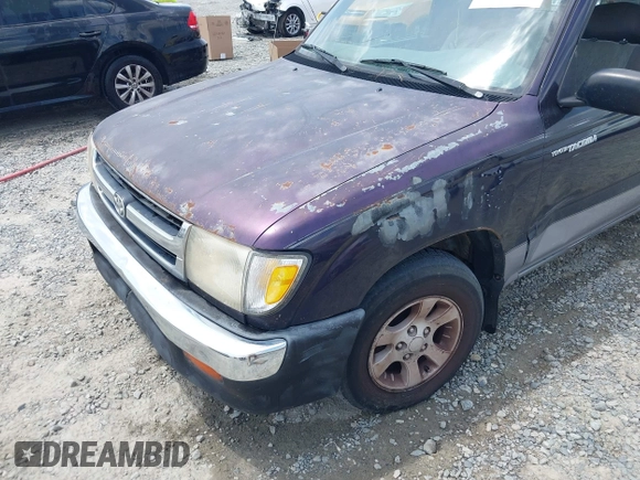 1999 Toyota Tacoma with VIN 4TAVL52N6XZ531014, listed as a IAAI auction lot 42170633 with 308,366 mi miles and . Bid and sale history available at DreamBid. Image 6.