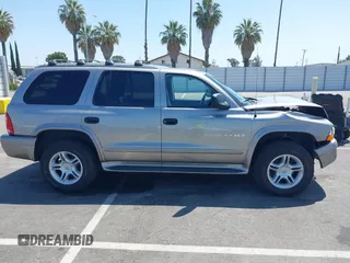 2001 Dodge Durango z VIN 1B4HS28ZX1F520696, wystawiony jako IAAI lot #42505170 z przebiegiem 72 299 mil mil oraz . Historia ofert i sprzedaży dostępna na DreamBid. Obrazek 13.