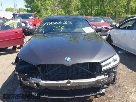 2021 BMW 5 Series 530i xDrive with VIN WBA13BJ0XMWX00677, listed as a IAAI auction lot 42100435 with 66,140 mi miles and . Bid and sale history available at DreamBid. Image 13.