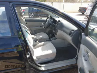 2008 Kia Spectra EX with VIN KNAFE121085549166, listed as a IAAI auction lot 41890354 with 214,401 mi miles. Bid and sale history available at carsss.com. Image 5.