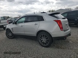 2013 Cadillac SRX Performance Collection z VIN 3GYFNHE3XDS622157, wystawiony jako Copart lot #53475675 z przebiegiem 95 253 mil mil oraz Szkoda całkowita • Salvage title. Historia ofert i sprzedaży dostępna na DreamBid. Obrazek 2.