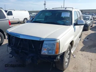 2005 Cadillac Escalade z VIN 1GYEC63TX5R114526, wystawiony jako IAAI lot #41685638 z przebiegiem 167 048 mil mil oraz . Historia ofert i sprzedaży dostępna na DreamBid. Obrazek 2.
