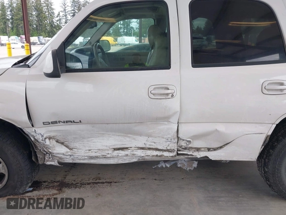 2004 GMC Yukon Denali z VIN 1GKEK63U84J148225, wystawiony jako IAAI lot #42218451 z przebiegiem 296 149 mil mil oraz . Historia ofert i sprzedaży dostępna na DreamBid. Obrazek 6.