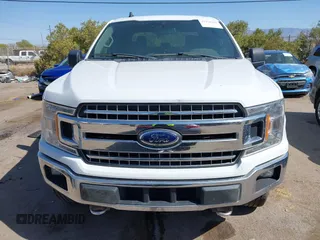 2020 Ford F-150 XL with VIN 1FTEW1E40LFA27089, listed as a IAAI auction lot 41978241 with 132,145 mi miles and . Bid and sale history available at DreamBid. Image 13.