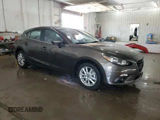 2015 Mazda 3 i Grand Touring with VIN JM1BM1M75F1231814, listed as a Copart auction lot 62692695 with 49,253 mi miles and Salvage title. Bid and sale history available at DreamBid. Image 4.