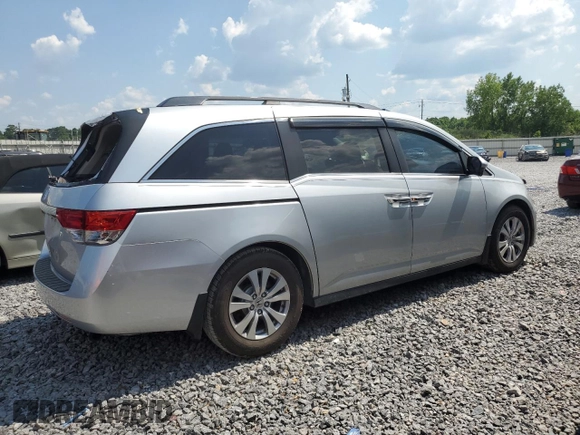 2014 Honda Odyssey EX-L with VIN 5FNRL5H63EB042207, listed as a Copart auction lot 61957605 with 204,563 mi miles and Salvage title. Bid and sale history available at DreamBid. Image 3.