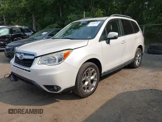 2015 Subaru Forester Touring with VIN JF2SJAWC9FH573973, listed as a IAAI auction lot 42380080 with 87,938 mi miles and . Bid and sale history available at DreamBid. Image 2.