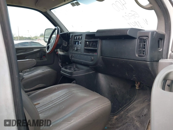 2014 Chevrolet Express Cargo Van with VIN 1GCSGAFX2E1121841, listed as a IAAI auction lot 42028712 with 164,768 mi miles. Bid and sale history available at carsss.com. Image 5.