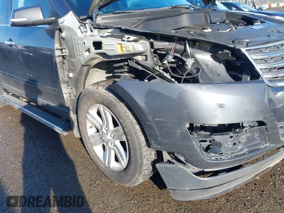 2013 Chevrolet Traverse LT with VIN 1GNKVGKD4DJ210384, listed as a IAAI auction lot 41881058 with 205,045 mi miles and . Bid and sale history available at DreamBid. Image 12.