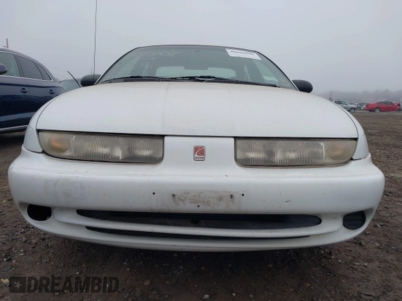 1997 Saturn SL z VIN 1G8ZK5272VZ270692, wystawiony jako IAAI lot #41926086 z przebiegiem 109 329 mil mil oraz . Historia ofert i sprzedaży dostępna na DreamBid. Obrazek 6.