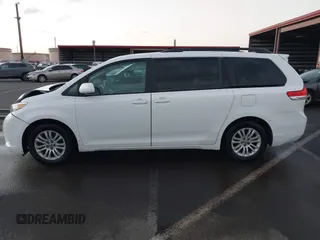 2014 Toyota Sienna XLE with VIN 5TDYK3DC1ES429932, listed as a IAAI auction lot 41692134 with 93,625 mi miles. Bid and sale history available at carsss.com. Image 15.
