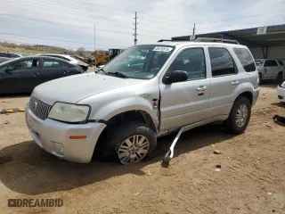 2007 Mercury Mariner Luxury with VIN 4M2YU91117KJ02032, listed as a Copart auction lot 50418815 with 128,498 mi miles and Salvage Title. Bid and sale history available at carsss.com. Image 1.