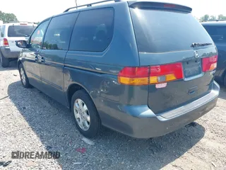 2004 Honda Odyssey EX-L with VIN 5FNRL18964B069905, listed as a IAAI auction lot 42583728 with 217,237 mi miles and . Bid and sale history available at DreamBid. Image 3.