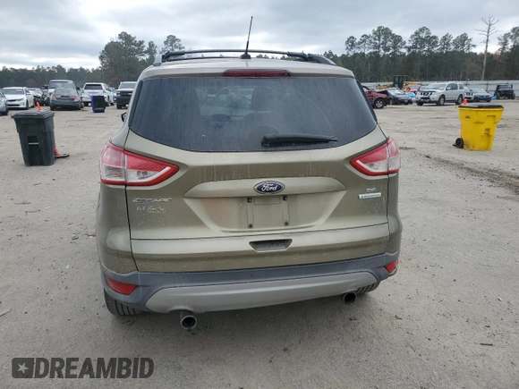 2013 Ford Escape SE with VIN 1FMCU0GX2DUB80872, listed as a Copart auction lot 85800144 with 98,304 mi miles and Salvage Title. Bid and sale history available at DreamBid. Image 6.