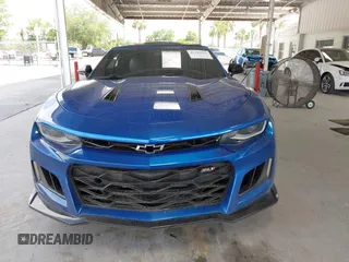 2016 Chevrolet Camaro 2LT z VIN 1G1FD3DX1G0173519, wystawiony jako IAAI lot #42345115 z przebiegiem 78 205 mil mil oraz . Historia ofert i sprzedaży dostępna na DreamBid. Obrazek 12.