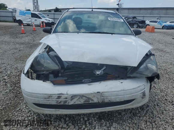 2003 Ford Focus SE with VIN 1FAFP34353W231334, listed as a Copart auction lot 63844205 with 86,601 mi miles and Salvage title. Bid and sale history available at DreamBid. Image 5.
