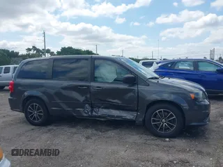 2015 Dodge Grand Caravan American Value with VIN 2C4RDGBGXFR682995, listed as a IAAI auction lot 41994708 with 142,725 mi miles and . Bid and sale history available at DreamBid. Image 13.