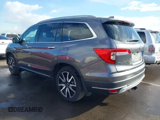 2019 Honda Pilot Touring 7-Passenger z VIN 5FNYF5H65KB020420, wystawiony jako IAAI lot #41575972 z przebiegiem 48 950 mil mil oraz . Historia ofert i sprzedaży dostępna na DreamBid. Obrazek 3.