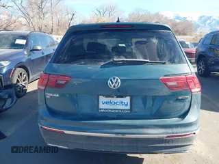 2021 Volkswagen Tiguan SE with VIN 3VV2B7AXXMM089913, listed as a IAAI auction lot 41402158 with 68,158 mi miles and . Bid and sale history available at DreamBid. Image 16.