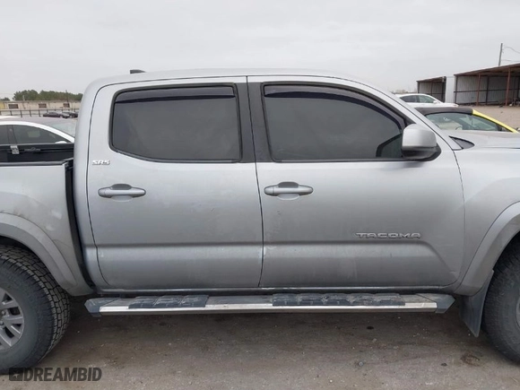 2018 Toyota Tacoma SR5 with VIN 3TMAZ5CN7JM053453, listed as a IAAI auction lot 41430111 with 128,149 mi miles. Bid and sale history available at carsss.com. Image 14.