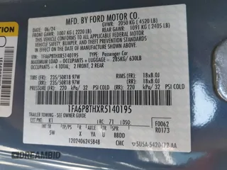 2024 Ford Mustang EcoBoost with VIN 1FA6P8THXR5140195, listed as a IAAI auction lot 42268566 with 11,032 mi miles and . Bid and sale history available at DreamBid. Image 9.