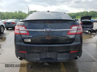2014 Ford Taurus Limited z VIN 1FAHP2J88EG177883, wystawiony jako Copart lot #56119255 z przebiegiem 141 743 mil mil oraz Szkoda całkowita • Salvage title. Historia ofert i sprzedaży dostępna na DreamBid. Obrazek 6.