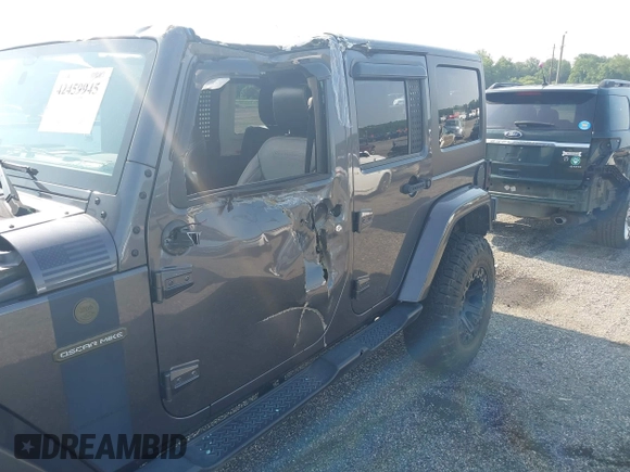 2016 Jeep Wrangler Unlimited Sport with VIN 1C4BJWDG9GL211030, listed as a IAAI auction lot 42459945 with 61,671 mi miles and . Bid and sale history available at DreamBid. Image 6.