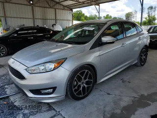 2016 Ford Focus SE z VIN 1FADP3F29GL268308, wystawiony jako Copart lot #56738415 z przebiegiem 111 702 mil mil oraz Szkoda całkowita • Salvage title. Historia ofert i sprzedaży dostępna na DreamBid. Obrazek 1.