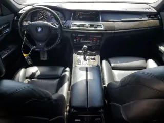2013 BMW 7 Series 750i with VIN WBAYA8C54DC996412, listed as a Copart auction lot 56982895 with 124,258 mi miles and Salvage title. Bid and sale history available at DreamBid. Image 8.