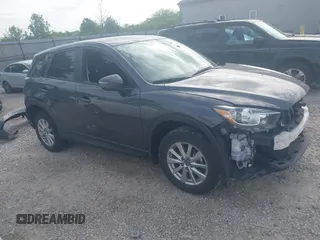 2016 Mazda CX-5 Touring z VIN JM3KE2CY0G0728555, wystawiony jako IAAI lot #42219436 z przebiegiem 78 622 mil mil oraz . Historia ofert i sprzedaży dostępna na DreamBid. Obrazek 1.