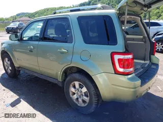 2009 Ford Escape Hybrid with VIN 1FMCU493X9KA56174, listed as a IAAI auction lot 39435925 with 158,171 mi miles. Bid and sale history available at carsss.com. Image 3.