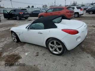 2006 Pontiac Solstice z VIN 1G2MB33B56Y106095, wystawiony jako Copart lot #79906094 z przebiegiem 54 475 mil mil oraz Szkoda całkowita • Salvage title. Historia ofert i sprzedaży dostępna na DreamBid. Obrazek 2.